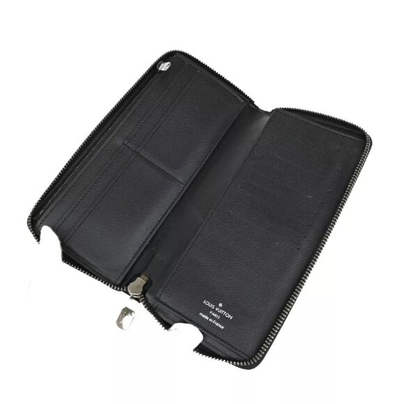 LOUIS VUITTON Zippy Wallet Vertical Monogram Eclipse Leather - Picture 4 of 13